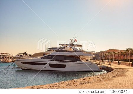 El Gouna Egypt 2.11.2025. A large white boat is docked at the pier El Gouna Egypt 2.11.2025. A large white boat is docked at the pier 136050243
