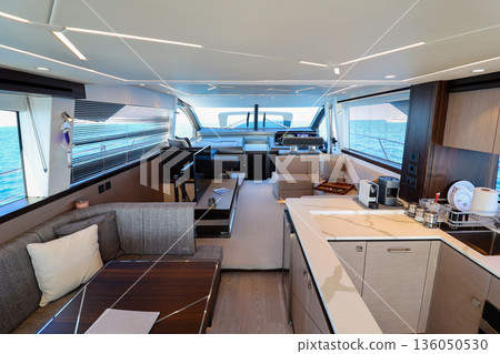 Contemporary yacht salon with kitchen and lounge area Contemporary yacht salon with kitchen and lounge area 136050530