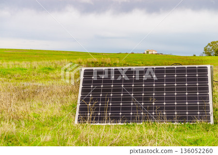 Portable solar photovoltaic panel outdoors 136052260