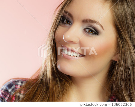 woman face with makeup and long hair woman face with makeup and long hair 136052366