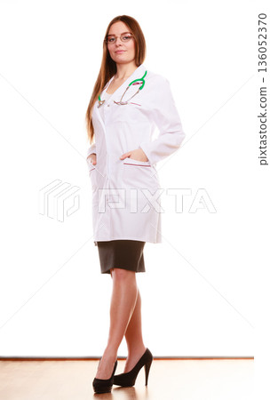 Smiling woman medical doctor with stethoscope. Smiling woman medical doctor with stethoscope. 136052370