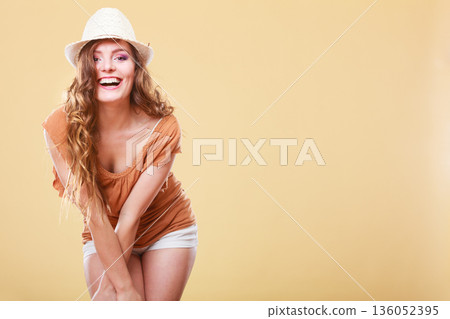 Charming woman in summer clothes straw hat Charming woman in summer clothes straw hat 136052395
