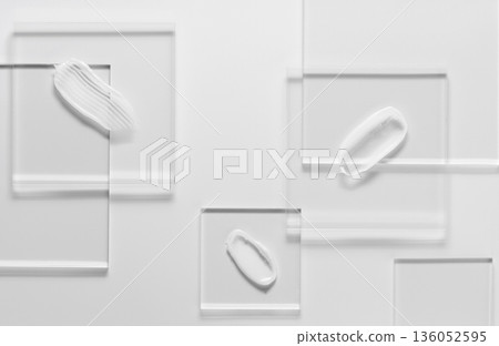White cosmetic skin care product on glass. White background. 136052595