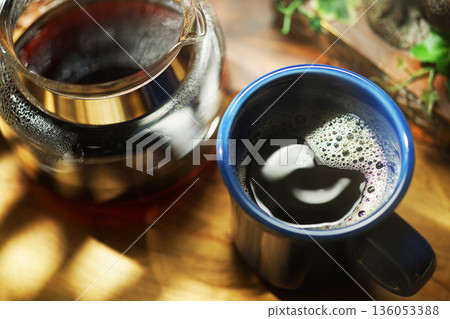 Coffee poured into mug 136053388