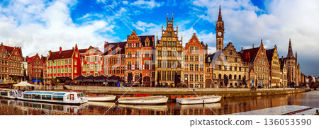 Ghent city historical center, tourists boats and colorful buildings on Leie river bank, Belgium Ghent city historical center, tourists boats and colorful buildings on Leie river bank, Belgium 136053590