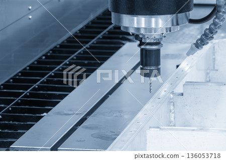 CNC Tapping Process on EV Battery Case Using Milling Machine in Blue Tone Industrial Scene CNC Tapping Process on EV Battery Case Using Milling Machine in Blue Tone Industrial Scene 136053718