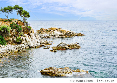 Beautiful seascape of the Cami de Ronda coastal path on the Costa Brava, from Platja d'Aro to Sant Antoni de Calonge. Cala del Pi Beautiful seascape of the Cami de Ronda coastal path on the Costa Brava, from Platja d'Aro to Sant Antoni de Calonge. Cala del Pi 136053946