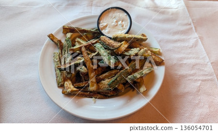 Fried zucchini with dipping sauce Fried zucchini with dipping sauce 136054701