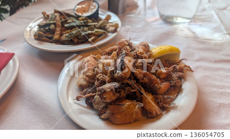 Fried zucchini and fried calamari 136054705