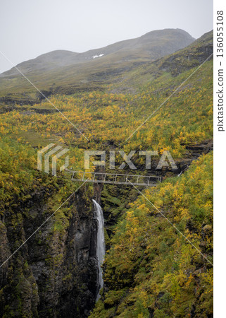 Autumn waterfall canyon with Gorsa Bridge above deep gorge in Norway Autumn waterfall canyon with Gorsa Bridge above deep gorge in Norway 136055108