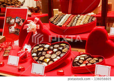 Heart shaped boxes of chocolate candies. Valentine Day concept Heart shaped boxes of chocolate candies. Valentine Day concept 136056605