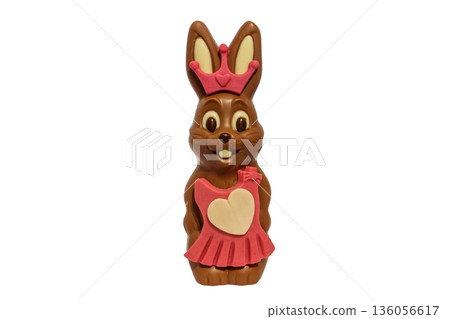Chocolate easter bunny in a dress isolated on white background Chocolate easter bunny in a dress isolated on white background 136056617