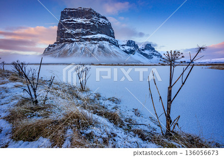 Lomagnupur mountain in Winter season,  with snow on yellow grass,  Iceland 136056673