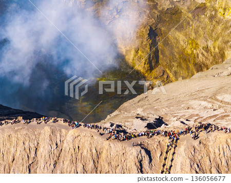 Aerial drone view creater of Bromo volcano with crowd, East Java, Indonesia Aerial drone view creater of Bromo volcano with crowd, East Java, Indonesia 136056677