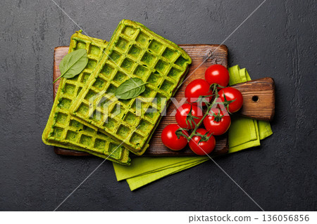 Vegan spinach waffles top view Vegan spinach waffles top view 136056856
