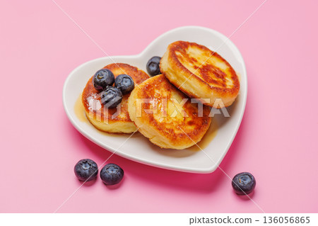 Homemade pancakes with blueberries and syrup 136056865