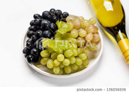 Wine bottle and fresh grapes Wine bottle and fresh grapes 136056936