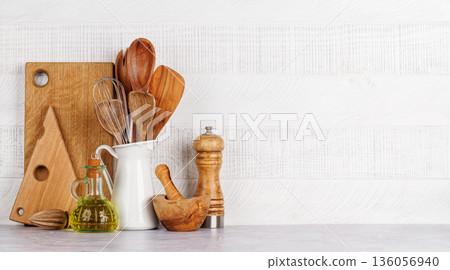 Kitchen utensils and spices on table Kitchen utensils and spices on table 136056940
