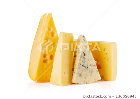 Assorted cheeses on white background Assorted cheeses on white background 136056945