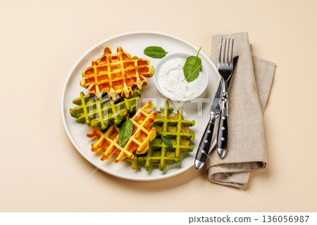 Vegan spinach waffles top view Vegan spinach waffles top view 136056987