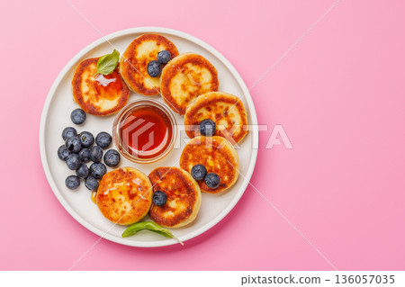 Homemade pancakes with blueberries and syrup 136057035