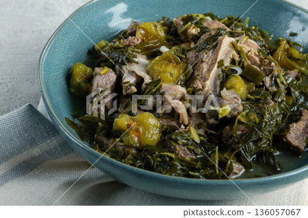 chakapuli, Georgian dish, stewed meat with herbs and tkemali, in white wine, homemade, no people, 136057067