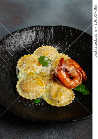 ravioli with shrimp, in cream sauce, with spices and herbs, top view, no people, ravioli with shrimp, in cream sauce, with spices and herbs, top view, no people, 136057068