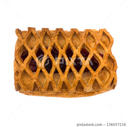 Pastry, mesh puff pastry bun with cherry filling on white background isolated Pastry, mesh puff pastry bun with cherry filling on white background isolated 136057216