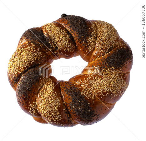 Sweet Slavic bun made in the shape of a ring and called Kalach 136057336
