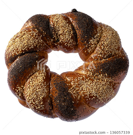 Sweet Slavic bun made in the form of a ring and called Kalach, on a white background in isolation Sweet Slavic bun made in the form of a ring and called Kalach, on a white background in isolation 136057339