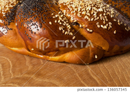 Sweet Slavic bun made in the shape of a ring and called Kalach Sweet Slavic bun made in the shape of a ring and called Kalach 136057345