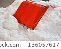 Snow removal tools buried in snow 136057617