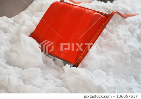 Snow removal tools buried in snow 136057617