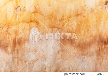 abstract pattern on silk fabric texture in yellow and brown tones 136058633