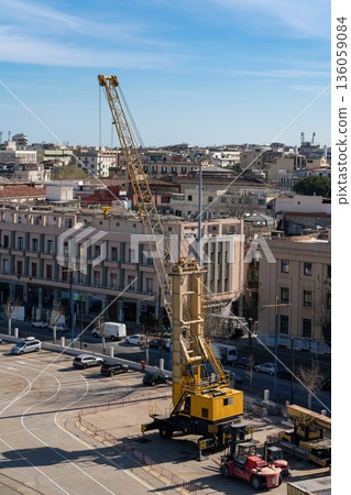 Mobile lattice boom crane at Messina port construction site, Italy 136059084
