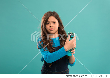 Ecology. Carry refillable bottle everywhere. Living healthy life. Health and water balance. Girl hold water bottle. Kid girl long hair has water bottle. Water balance concept. Drink some liquids Ecology. Carry refillable bottle everywhere. Living healthy life. Health and water balance. Girl hold water bottle. Kid girl long hair has water bottle. Water balance concept. Drink some liquids 136059101