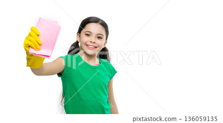 girl cleaner do chores on background, copy space. photo of girl cleaner do chores with duster. girl cleaner do chores on background, copy space. photo of girl cleaner do chores with duster. 136059135