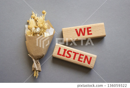 We listen symbol. Wooden blocks with words We listen. Beautiful grey background. Business and We listen concept. Copy space. We listen symbol. Wooden blocks with words We listen. Beautiful grey background. Business and We listen concept. Copy space. 136059322