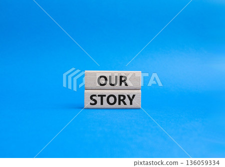Our story symbol. Wooden blocks with words Our story Beautiful blue background. Business and Our story concept. Copy space. Our story symbol. Wooden blocks with words Our story Beautiful blue background. Business and Our story concept. Copy space. 136059334