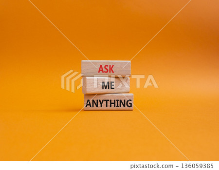 Question symbol. Concept words Ask me Anything on wooden blocks. Beautiful orange background. Business and Ask me Anything concept. Copy space Question symbol. Concept words Ask me Anything on wooden blocks. Beautiful orange background. Business and Ask me Anything concept. Copy space 136059385