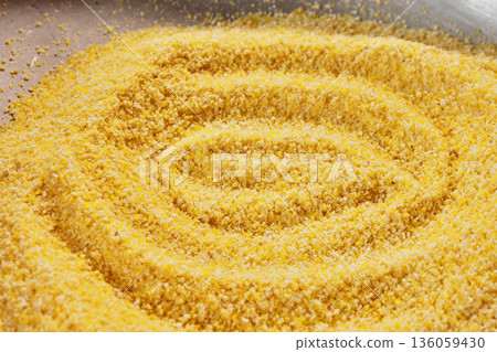 Grains of rustic yellow polenta Grains of rustic yellow polenta 136059430