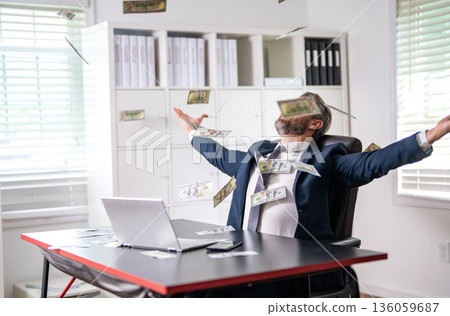 Investment success. Business success. Businessman counting money at office. Business man counting dollar. Rich happy Hispanic boss waste money. Successful finance businessman 136059687