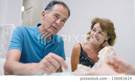 Senior couple consulting with dentist about dental health Senior couple consulting with dentist about dental health 136061614