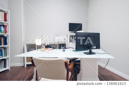 Empty dentist office desk with computer 136061623