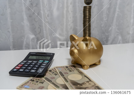 Image of calculating money 136061675