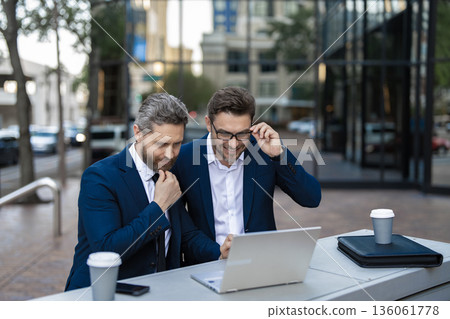 Businessmen. Freelance business success. Freelance online. Successful businessmen freelance online. Businessmen freelancing in New York. Freelancer developer do business online. Presentation laptop Businessmen. Freelance business success. Freelance online. Successful businessmen freelance online. Businessmen freelancing in New York. Freelancer developer do business online. Presentation laptop 136061778