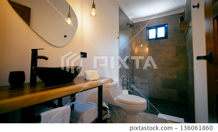 Modern bathroom interior combining natural wood and dark fixtures Modern bathroom interior combining natural wood and dark fixtures 136061860