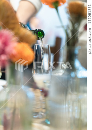 Champagne being poured at a wedding Champagne being poured at a wedding 136061881