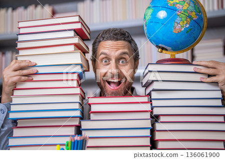 man nerd with school book. school literature education. nerd man in classroom. bookworm in school library. education and knowledge. man teacher in class. school education. Get lost in the pages 136061900