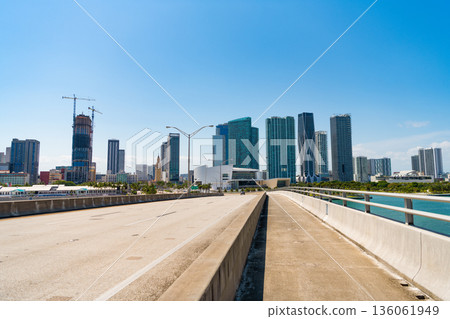 Bridge road over river on urban skyline Bridge road over river on urban skyline 136061949